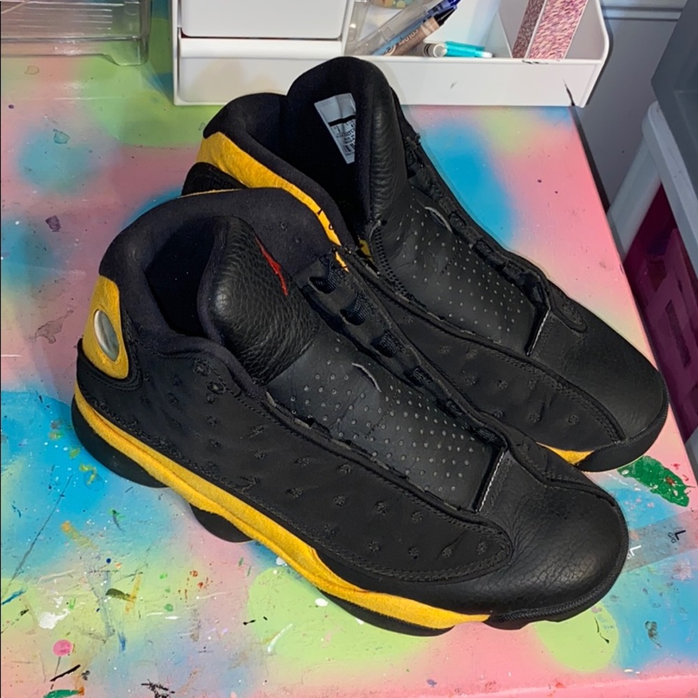 Yellow and Black Jordan 13s